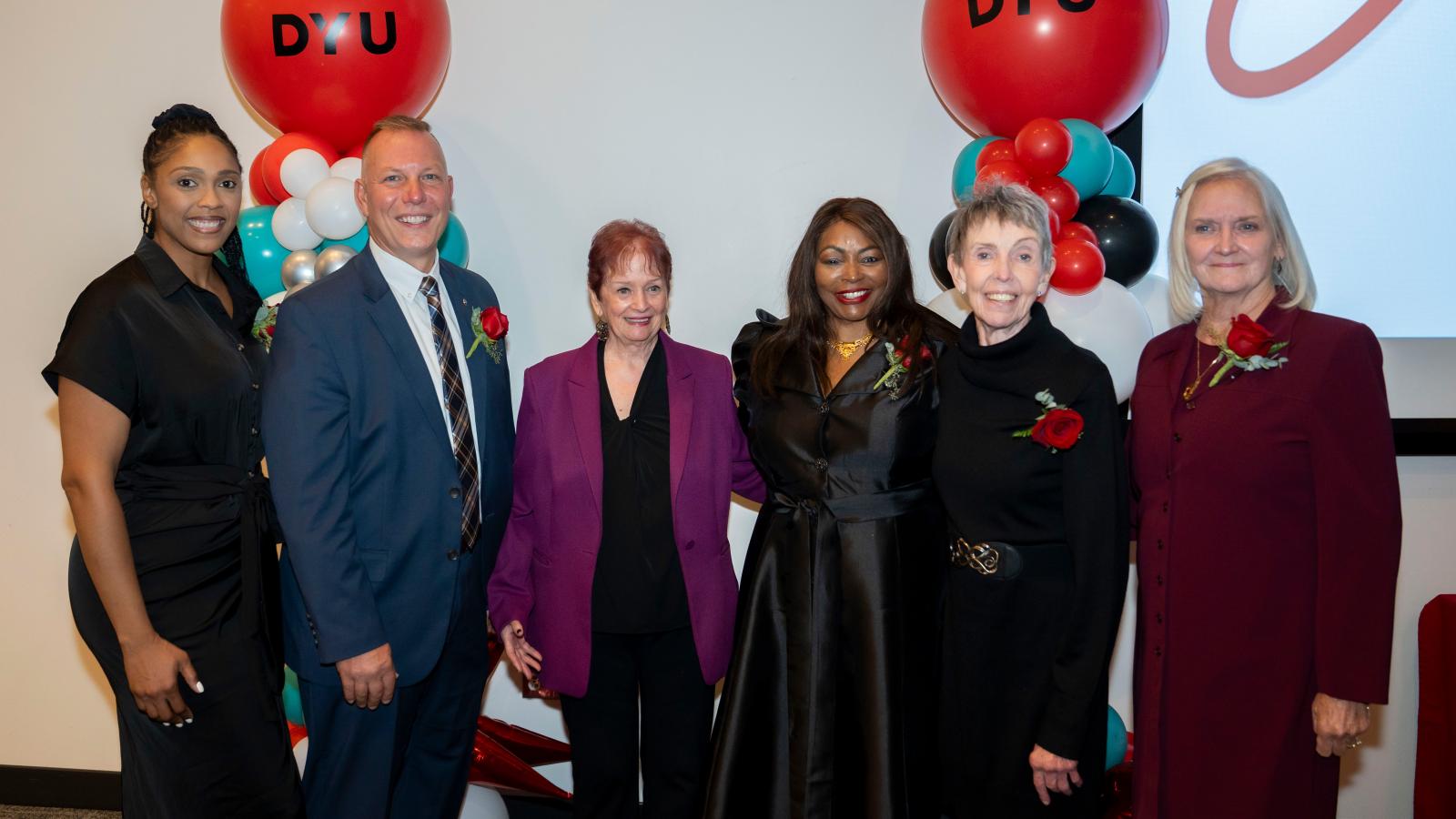 Dara Gill, Dr. Mark Beehler, Fran Schmidt, Dr. Marjorie Quint-Bouzid, Christine Yakubec, Judy Po-Chedly Wilkins stand for a group photo