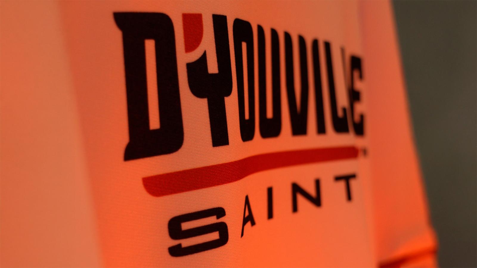 close up of jersey that reads D'Youville Saints