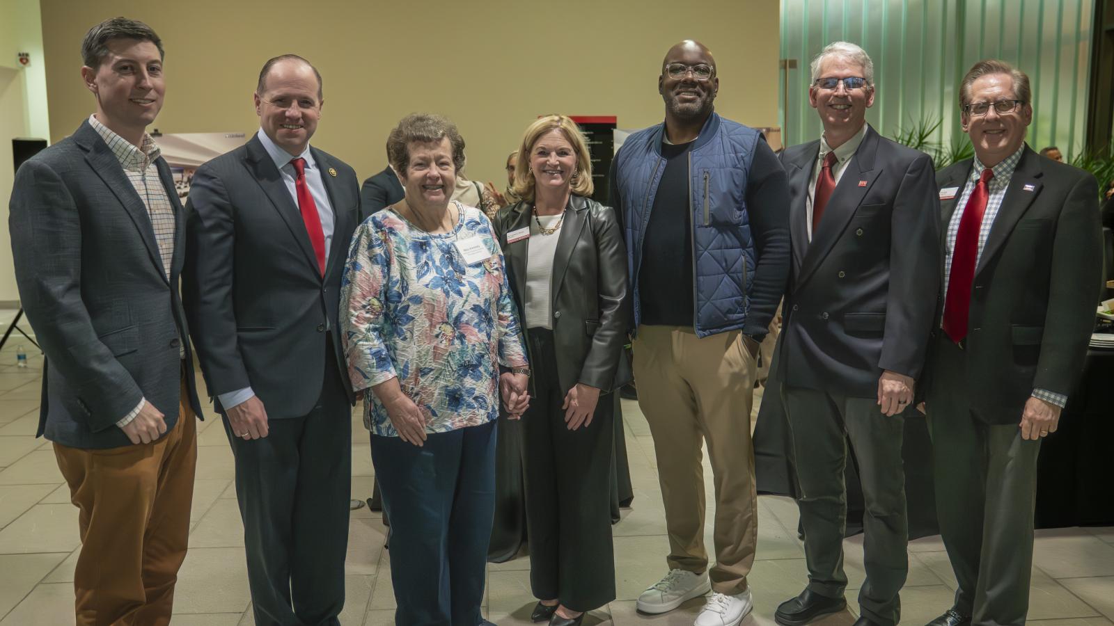 Dr. Jason MacLeod, Congressman Tim Kennedy, Mary Kennedy, Dr. Lorrie Clemo, Legislator Lawrence J. Dupre, Dr. Jay Danto, and Dr. Britt Davis stand together for a group photo