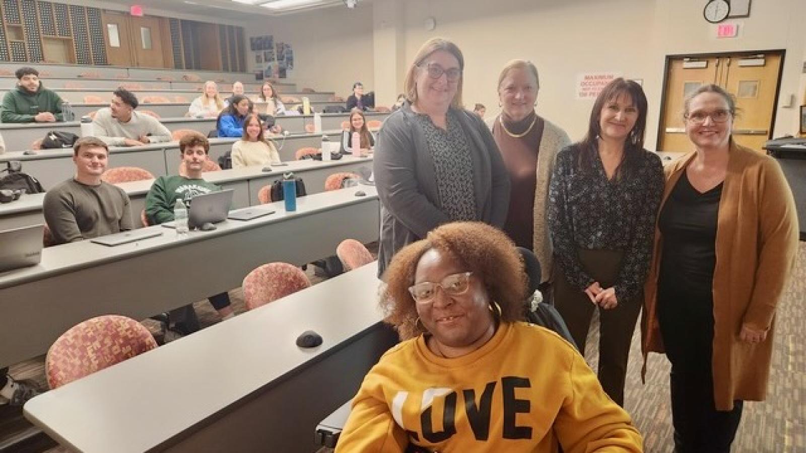 Pictured (front): Shanell Davis, senior advocate; (left to right): Molly Zern-Hehir, associate vice president of rehabilitative services, Lynn Rivers, program director at D'Youville University, Catherine Burger, director of learning and development, and Jodie Chibi, director of language services