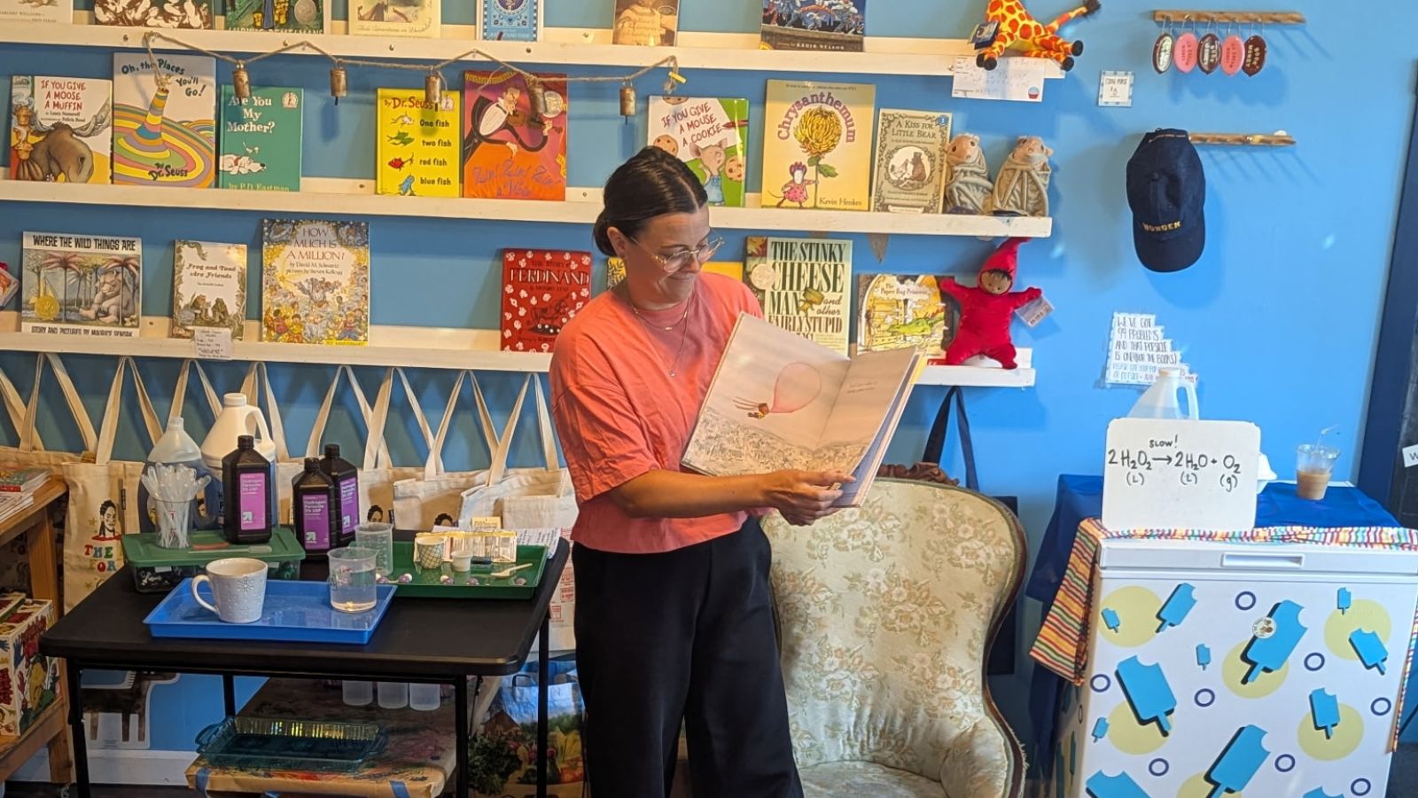 image of Dr. Liwosz reading her book to a class