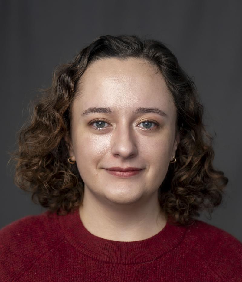 a woman smiling at the camera