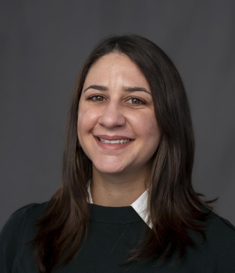 woman smiles at the camera