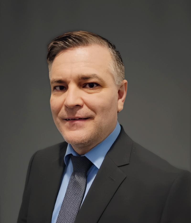 man smiles at camera