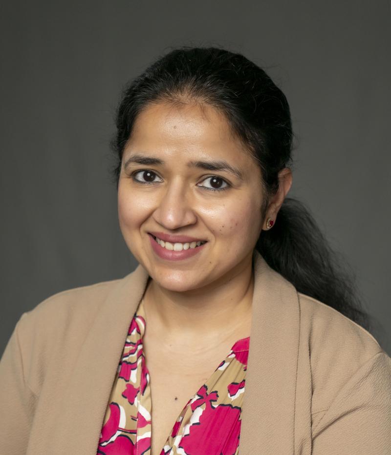 woman smiles at the camera