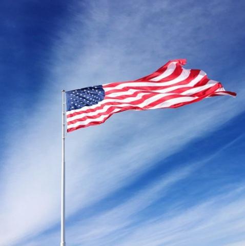 The flag of the United States waving in the wind.