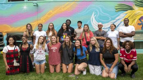 Group of students smiling for photo