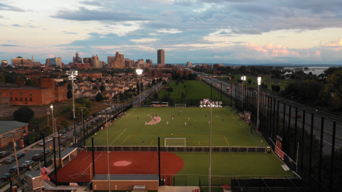 Aerial photo of Dobson field with the Buffalo city skyline in the background