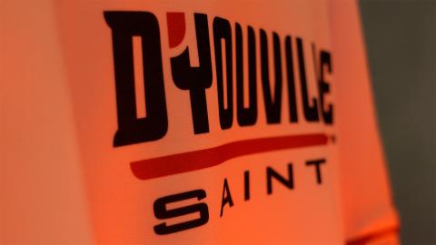 close up of jersey that reads D'Youville Saints
