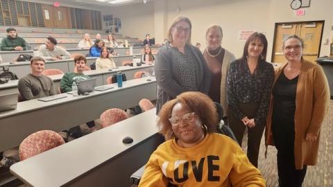 Pictured (front): Shanell Davis, senior advocate; (left to right): Molly Zern-Hehir, associate vice president of rehabilitative services, Lynn Rivers, program director at D'Youville University, Catherine Burger, director of learning and development, and Jodie Chibi, director of language services