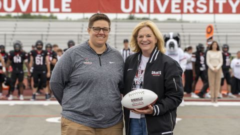 Dr. Clemo with Coach Ona Halladay Vice President for Athletics and Planning at Ceremonial Sprint Football 