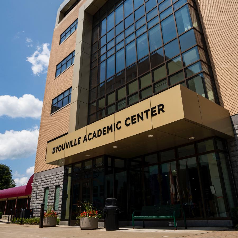 Front of five story building with sign that reads D'Youville Academic Center