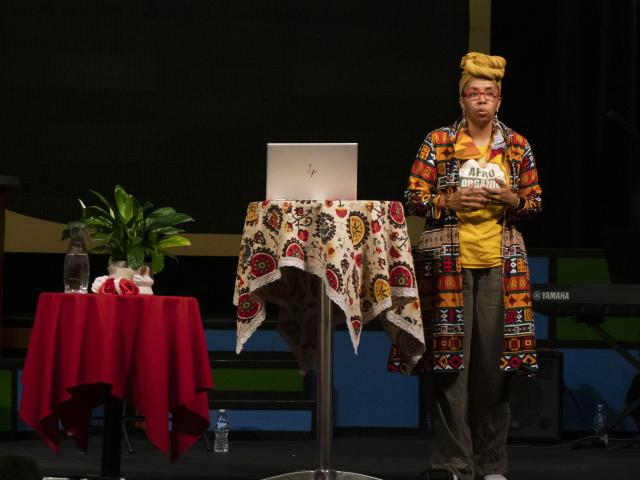 Pastor Kwame Pitts speaks on Kavinoky Theatre stage
