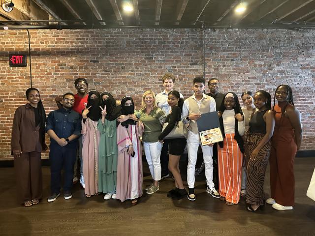 HEOP Students gather for a group photo at an awards dinner