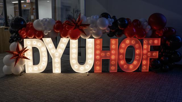 Marquee Letters that read DYU HOF with balloons surrounding