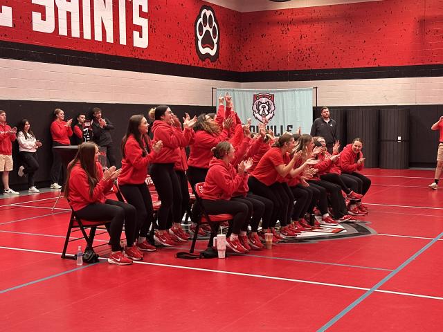 dyouville university softball team cheers as their name is announcement at the selection event for the ncaa tournament