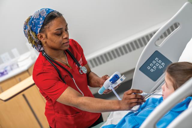 The patients in D’Youville’s nursing simulation center can be actual humans, too. Many are brought in to act out real-life symptoms to provide better training for students.