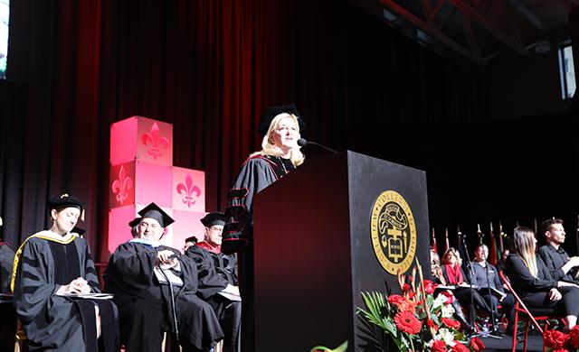 D'Youville President Lorrie Clemo addresses the graduates.