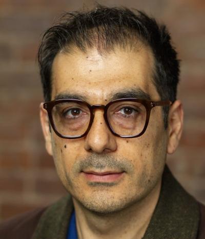 Mohammad Haghighi posing for a headshot
