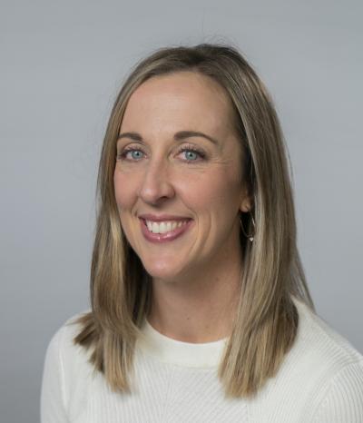 woman smiles at the camera