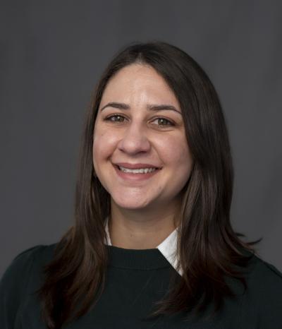 woman smiles at the camera