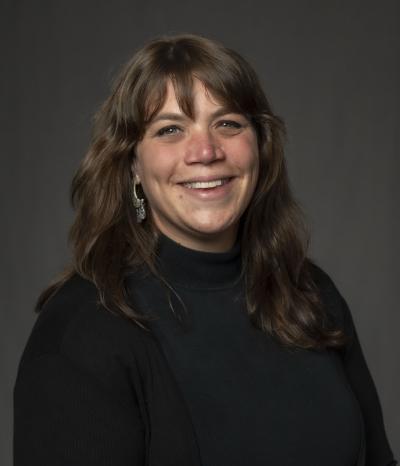 woman smiles at the camera