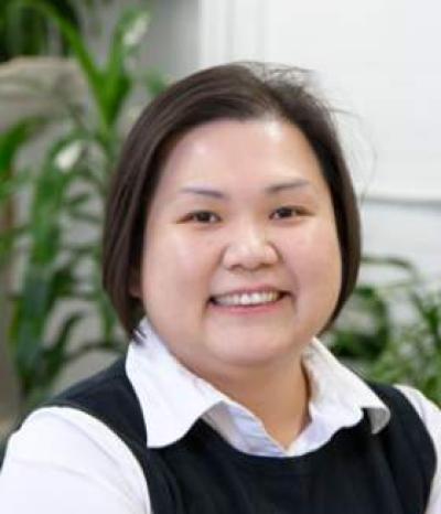 woman smiles at the camera