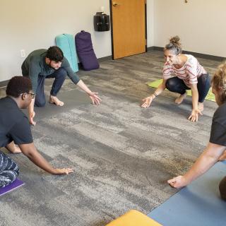 students participating in movement class