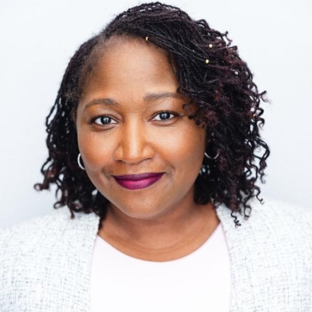 Aaliyah El-Amin-Turner smiling at camera