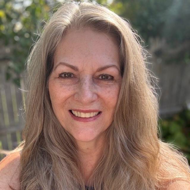 marla britton smiling at camera