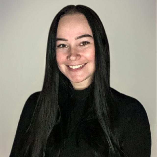 woman smiles at the camera